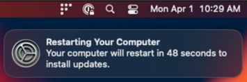macOS restart notification after OS update.